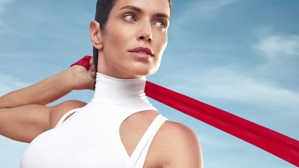 Three Biotherm Blue Therapy products including serum and creams, shown with fluid background and labeled ‘NEW / NOUVEAU’.